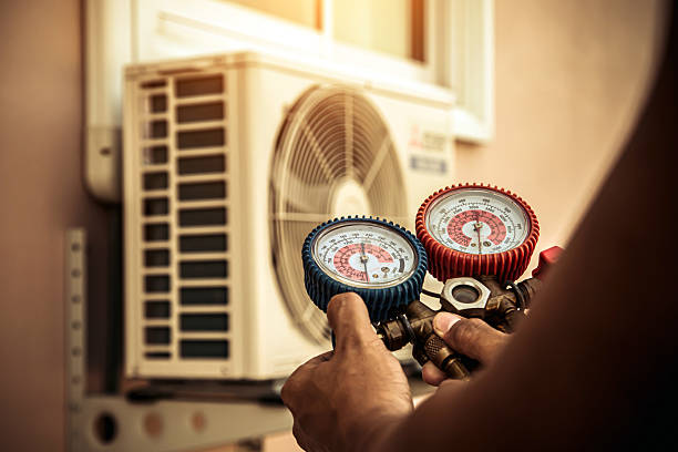 Professional Heat Pump Repair technician working in Farmington, IL